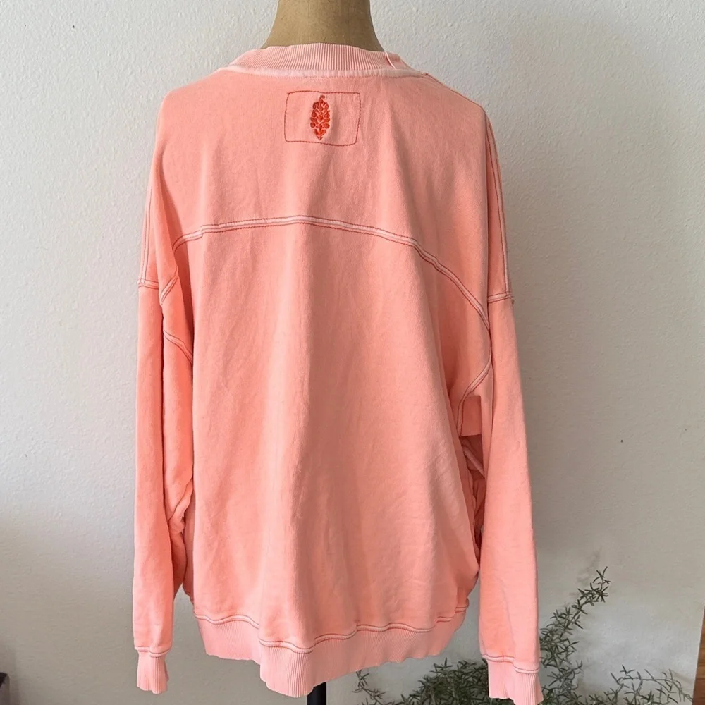 Free People Movement sz M oversized salmon pink sweatshirt great pre owned cond